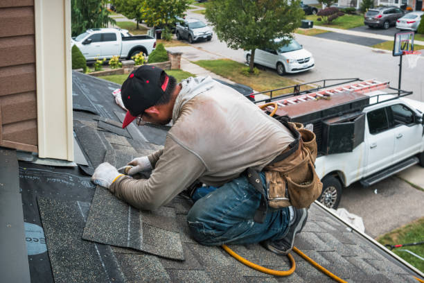 Professional Roofing technician working in Spanishburg, WV